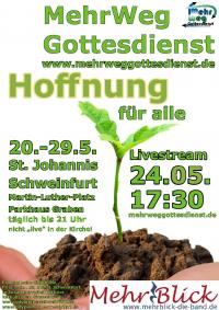 Keimling in etwas Erde auf einer Hand