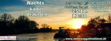 Schiff auf dem vereisten Main bei Sonnenuntergang