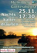 Schiff auf dem vereisten Main bei Sonnenuntergang